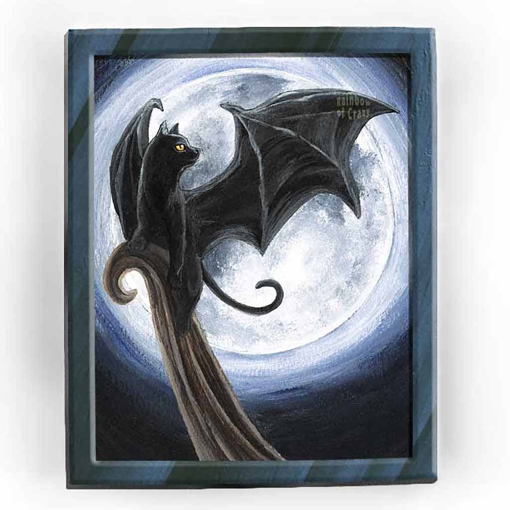 an art print with an illustration of a black cat, with bat wings, perched on a cliff, in front of a full moon