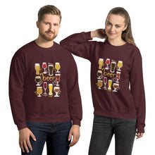 Load image into Gallery viewer, A man and woman wearing the Beer Lovers Unisex Sweatshirt in the colour maroon, featuring a graphic of 10 styles of beer in 10 different glasses
