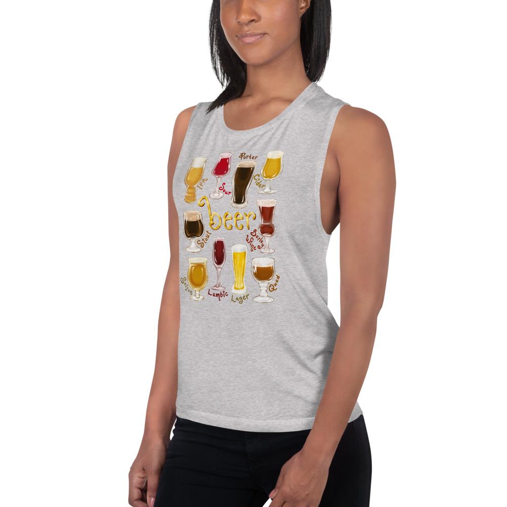 A woman is wearing the Beer Lovers Women's Muscle Tank Top in the colour athletic heather grey, printed with an image of 10 different styles of beer in 10 different glasses.