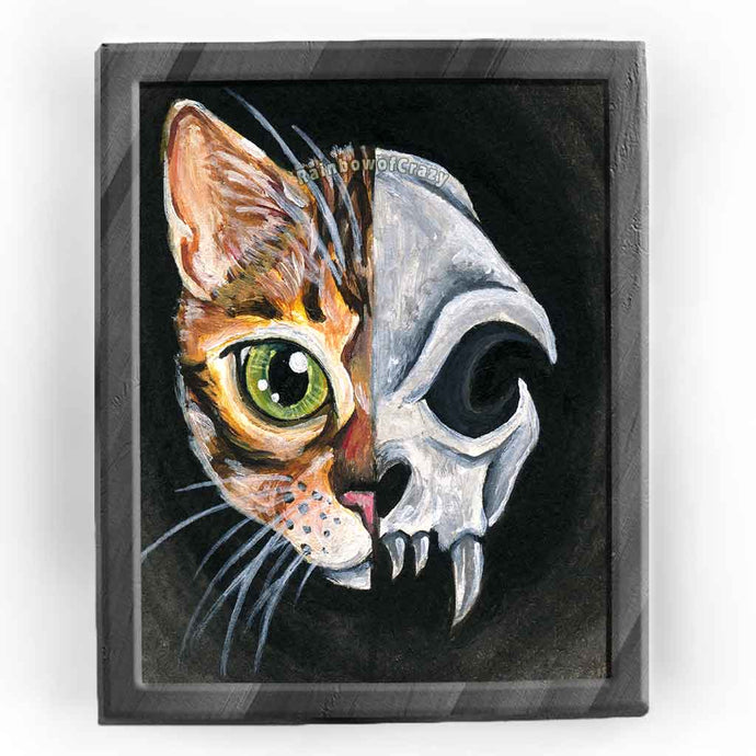 an art print, with an illustration of a portrait split into two halves: the left side features a bengal cat's face, and the right side features an evil looking cat skull