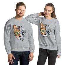 Load image into Gallery viewer, A man and woman are wearing a unisex sweatshirt in the colour sport grey, printed with art split into two: the left side features the face of a bengal cat, and the right side features an evil looking cat skull.
