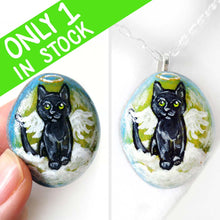 Load image into Gallery viewer, Rock art of a black cat as an angel, painted on a small beach stone, it&#39;s available alone or as a pendnat necklace.
