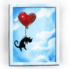 Load image into Gallery viewer, art print featuring an illustration of a black cat flying through a blue sky with a red, heart shaped balloon tied to its waist.
