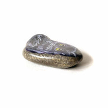 Load image into Gallery viewer, small rock art, hand painted with art of a black persian cat with yellow eyes
