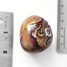 Load image into Gallery viewer, a small beach stone hand painted with a boxer dog
