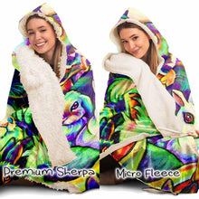 Load image into Gallery viewer, side by side image of a woman wearing the Bunny Lovers Rainbow Hooded Blanket, the left linked with sherpa, and the right, lined with microfiber fleece
