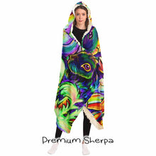 Load image into Gallery viewer, a woman wears the Bunny Lovers Rainbow Hooded Blanket, linked with sherpa
