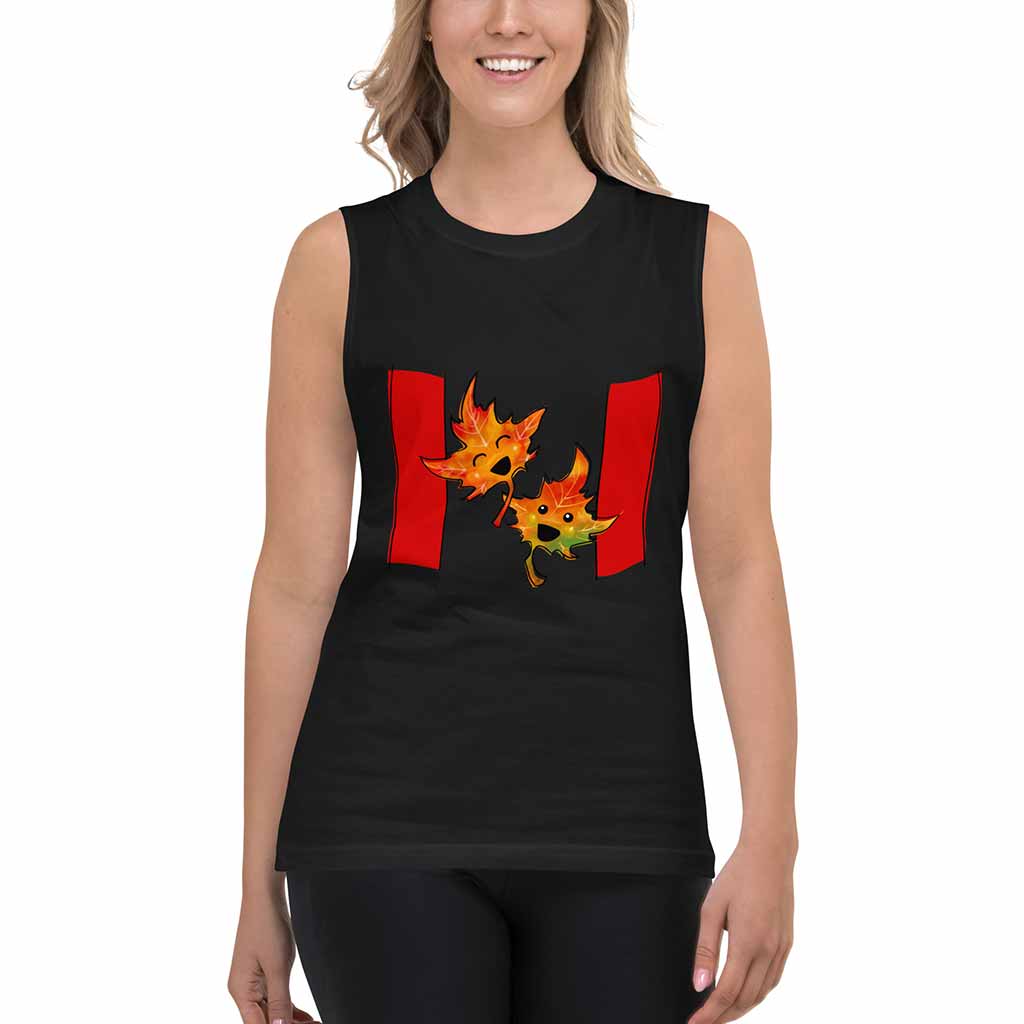 a woman wearing a black unisex muscle tank top, featuring a print of a stylized Canada flag graphic with two smiling maple leaves in the middle