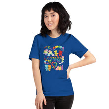 Load image into Gallery viewer, A woman wearing the Candy Lovers Premium Unisex T-shirt in true royal blue, which includes a graphic of 10 types of rainbow candy
