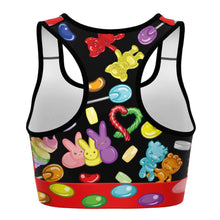 Load image into Gallery viewer, The Candy Lovers Sports Bra, featuring art of different rainbow candy.
