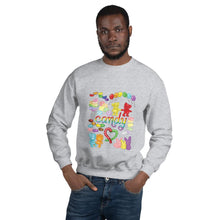 Load image into Gallery viewer, A man wearing the Candy Lovers Unisex Sweatshirt in the colour sport grey. It features a print of ten different types of candy in rainbow colours
