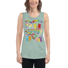 Load image into Gallery viewer, A woman is wearing the Candy Lovers Women&#39;s Muscle Tank Top, in the colour dusty blue, which is printed with a graphic of 10 types of candy in rainbow colours.
