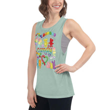 Load image into Gallery viewer, A woman is wearing the Candy Lovers Women&#39;s Muscle Tank Top, in the colour dusty blue, which is printed with an illustration of 10 types of candy in rainbow colours.
