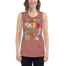 Load image into Gallery viewer, A woman is wearing the Candy Lovers Women&#39;s Muscle Tank Top, in the colour mauve, which is printed with art of 10 types of candy in rainbow colours.
