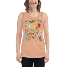 Load image into Gallery viewer, A woman is wearing the Candy Lovers Women&#39;s Muscle Tank Top, in the colour peach, which is printed with an image of 10 types of candy in rainbow colours.
