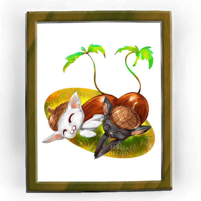 an art print featuring a digital illustration of a black cat and white cat painted as acorns, having a cat nap on the grass.