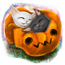 Load image into Gallery viewer, an art print featuring an illustration of a black cat and white cat napping together in a blanket shaped like a jack o&#39;lantern
