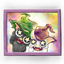 Load image into Gallery viewer, an art print featuring an illustration of a black cat wearing a green witch hat, and a white cat wearing a purple witch hat. with stars in their eyes, they&#39;re looking at the viewer in awe.
