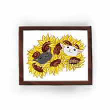 Load image into Gallery viewer, an art print featuring an illustration of a black cat and white cat peeking out from a bunch of sunflowers
