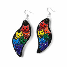 Load image into Gallery viewer, wavy leaf shaped wood earrings, hand painted with six different cartoon cats in every colour of the rainbow, with a black background
