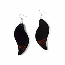 Load image into Gallery viewer, wavy leaf shaped wood earrings, hand painted with six different cartoon cats in every colour of the rainbow, with a black background, the back signed with, Rainbow of Crazy

