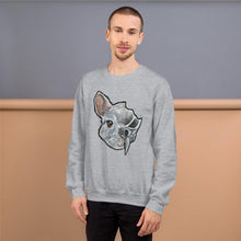 Load image into Gallery viewer, A man wears a unisex sweatshirt in the colour sport grey, which is printed with art of a split image: the left side features a chinchilla&#39;s face and the right side features an evil looking chinchilla skull
