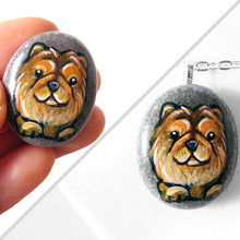 Load image into Gallery viewer, a small stone painted with the portrait of chow chow dog, available at a keepsake or necklace.
