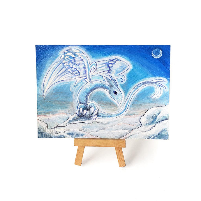 Original art, painted with acrylics on watercolour paper, of a cloud dragon, spreading its wings as it rearranges the clouds in the blue sky.