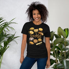 Load image into Gallery viewer, A woman is wearing the Cookie Lovers Unisex Premium T-shirt in the colour black heather, features art of 10 different types of cookies.
