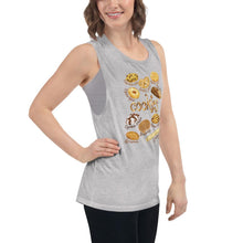 Load image into Gallery viewer, A woman is wearing the Cookie Lovers Women&#39;s Muscle Tank Top in the colour athletic heather grey, which is printed with a graphic of 10 different types of cookies
