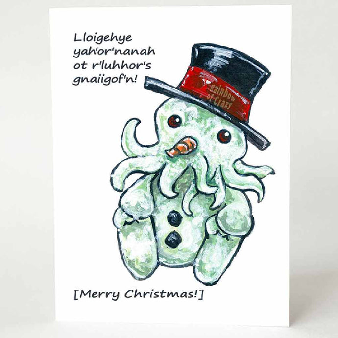 A Christmas card with art of Cthulhu as a snowman. It reads, 