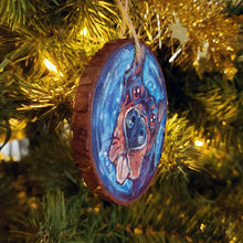 Load image into Gallery viewer, A Christmas wood ornament, featuring art of a doberman with a big blop of the tongue.
