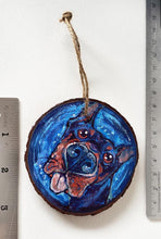 Load image into Gallery viewer, A Christmas wood ornament, featuring art of a doberman with a big blop of the tongue.
