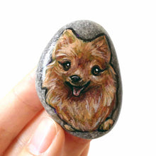 Load image into Gallery viewer, a small rock art featuring a smiling pomeranian dog
