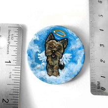 Load image into Gallery viewer, a lightweight wood disc, hand painted with the portrait of a yorkshire terrier as an angel, available as a keepsake or pendant necklace
