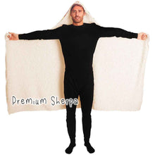 Load image into Gallery viewer, a man is wearing the Autumn Fairy Cats Hooded Blanket with premium sherpa lining, featuring art of a white/orange  cat, and black/blue cat, each with leaf wings
