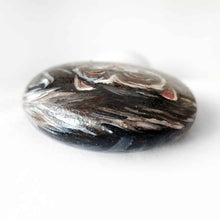 Load image into Gallery viewer, a small beach stone, hand painted with a portrait of a smiling ferret with its tongue out
