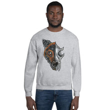 Load image into Gallery viewer, A man is wearing a unisex sweatshirt in the colour sport grey, which is printed with a split illustration: the left side features the face of a flying fox bat, and the right side features an evil looking bat skull
