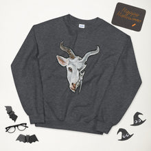 Load image into Gallery viewer, A unisex sweatshirt in the colour dark heather grey, printed with an illustration of a split image: the left side features the face of a goat, and the ride side features an evil looking goat skull
