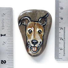 Load image into Gallery viewer, hand painted rock art of a smiling brown greyhound dog, next to two rulers to show its size: 1 3/4&quot; x 1 5/16&quot; or 4.5 cm x 3.3 cm
