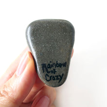 Load image into Gallery viewer, the back of a greyhound portrait stone, signed with, &quot;rainbow of crazy&quot;
