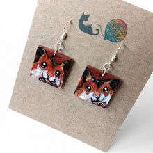 Load image into Gallery viewer, small square wood earrings, hand painted with faces of golden hamsters
