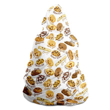 Load image into Gallery viewer, a woman wearing the Happy Cookies Hooded Blanket, featuring 10 illustrated smiling cookies patterned all over
