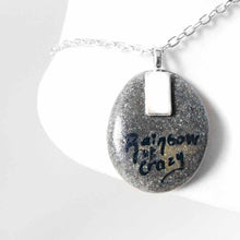 Load image into Gallery viewer, the back of a hot air balloon necklace, signed with, Rainbow of Crazy
