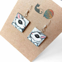 Load image into Gallery viewer, small square fish hook, wood earrings, hand painted with hot rabbit portraits
