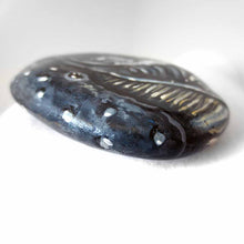 Load image into Gallery viewer, portrait of a humpback whale, hand painted on a flat, round rock
