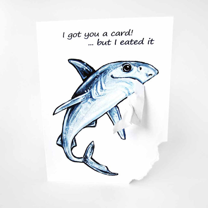 a greeting card with art of a blue shark. text reads, 