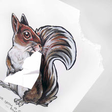 Load image into Gallery viewer, a greeting card featuring an illustration of a red squirrel. the right corner of the front of the card has been ripped off and is attached to the squirrel&#39;s mouth. the card reads, &quot;I got you a card! ...but I eated it&quot;
