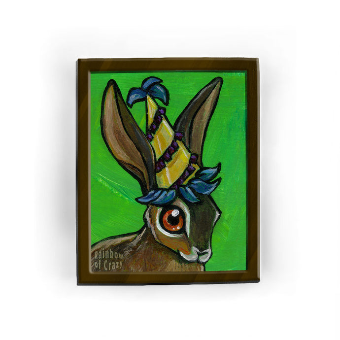 This art print features a cute portrait of a jackrabbit wearing a capuchon hat.