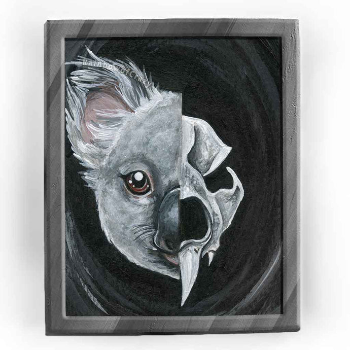 This art print features two sides of a koala: the left side shows half of a koala's gave, while the right side reveals the koala's dark, stylized skull underneath